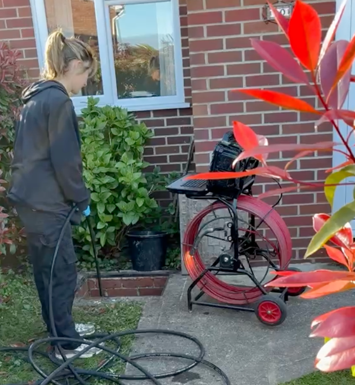 Flow Sure Drains engineer high-pressure jetting a blocked drain in Bristol
