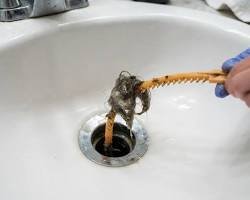 Hair and soap build-up removed from a blocked sink trap in Bristol